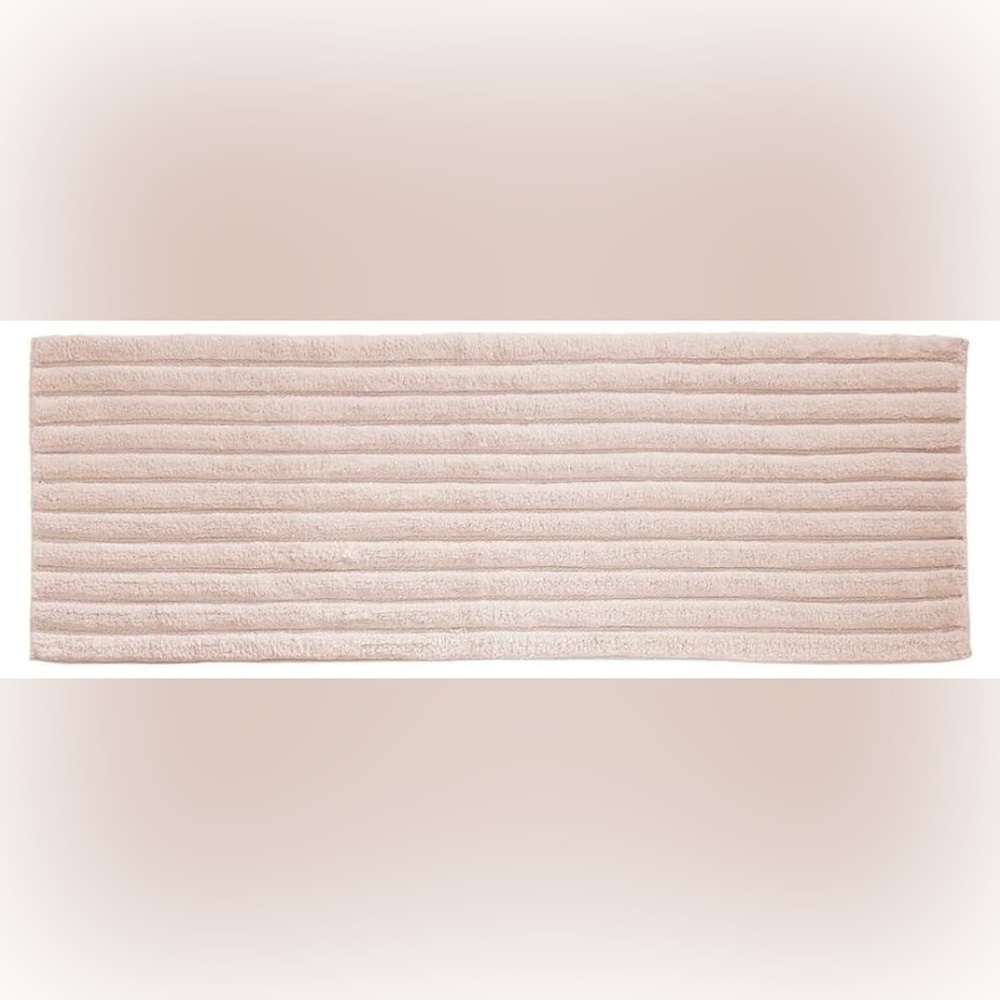 Light pink plush bathroom rug - 60" x 21"